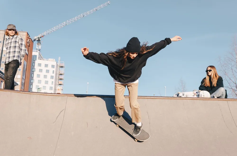 Try out skateboarding